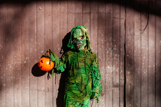 Boy with zombie costume on Halloween portrait
