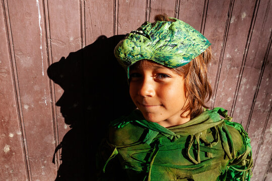 Smiling boy in costume on Halloween day