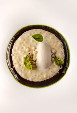 Yummy Ice Cream With Quinoa In Bowl On White Background