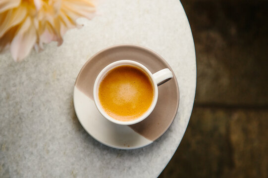 Large Dahlia flowers and a cup of espresso.