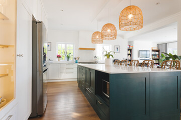 General view of luxury kitchen with countertop and kitchen equipment