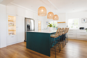 General view of luxury kitchen with countertop and kitchen equipment