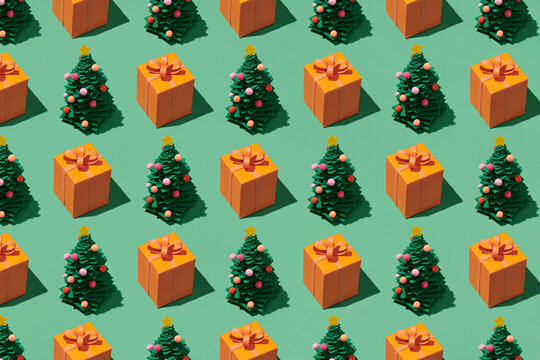 Pattern made from present gift boxes on green background
