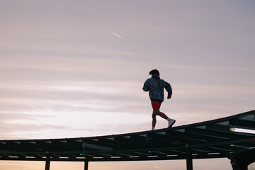 Young male running 