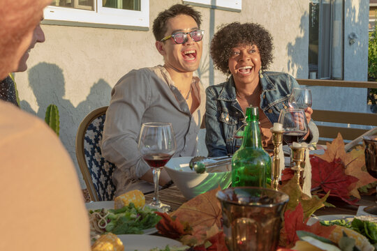 Happy Couple At An Outdoor Dinner Party