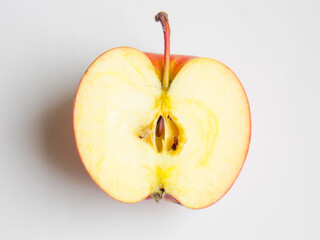 Half an apple on a white background