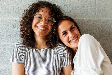 Friends laughing at camera