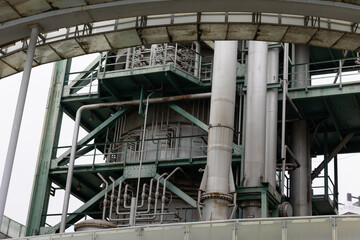 Lots of pipes on the surface of the oil and gas processing tower