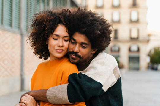 Loving Couple Embracing Outside