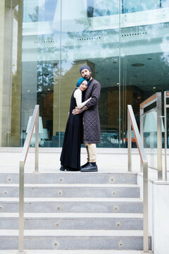 alternative couple flirting in the city
