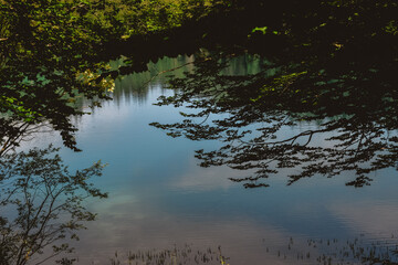 Italian mountain lake with a blue reflection