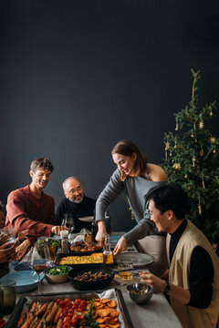 People Having Christmas Dinner Party