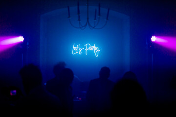 Let's Party sign in a club