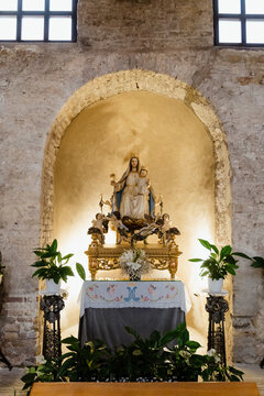 The statue of the Madonna inside a church