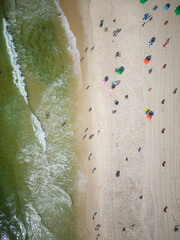 Fototapeta na wymiar Beautiful top down view to Copacabana beach with water and umbrellas