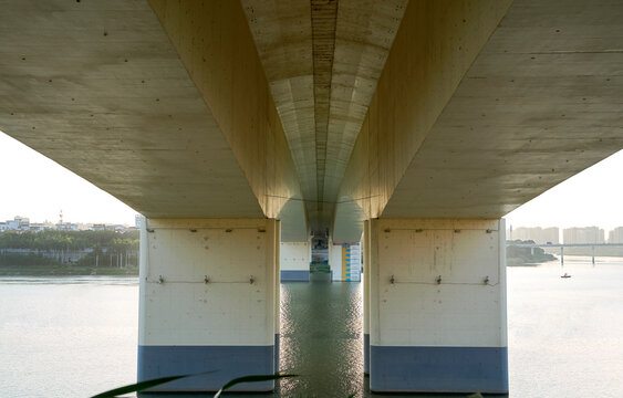 Closeup structure of the bridge under the city river bridge