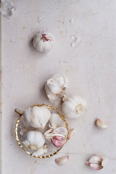 Garlic on marble kitchen top