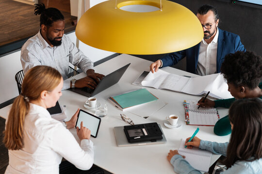 People Working Together In A Business Meeting