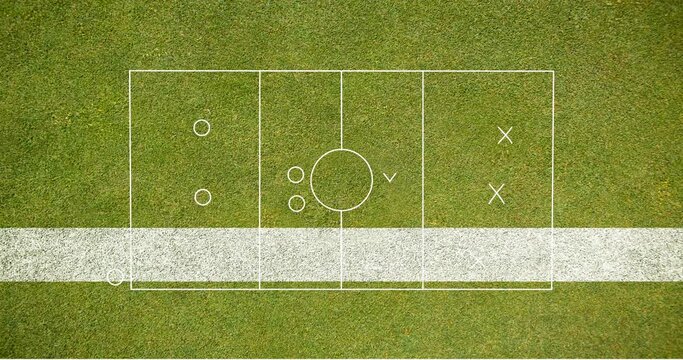 Animation of soccer playbook drawing representing game plan over grassy field