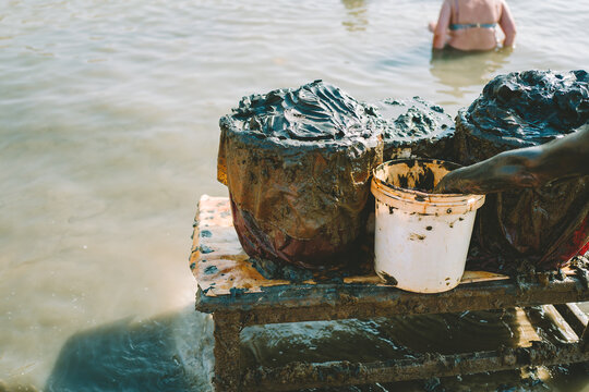 Large tubs of mud on the shoreline of the Dead Sea