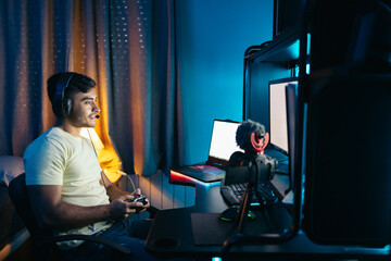 Gamer playing video games and streaming it online