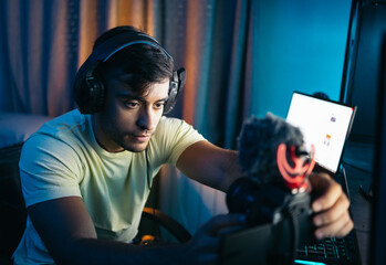 Gamer playing video games and streaming it online