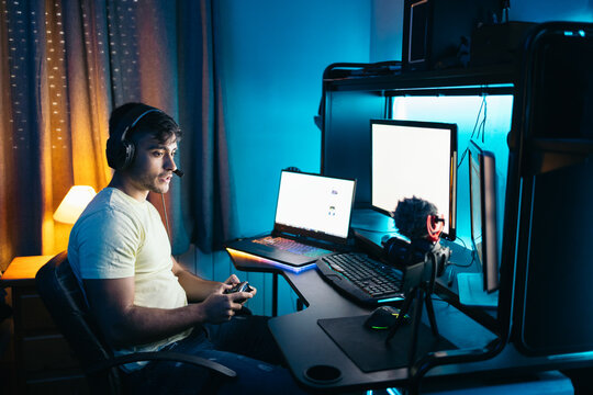 Gamer playing video games and streaming it online