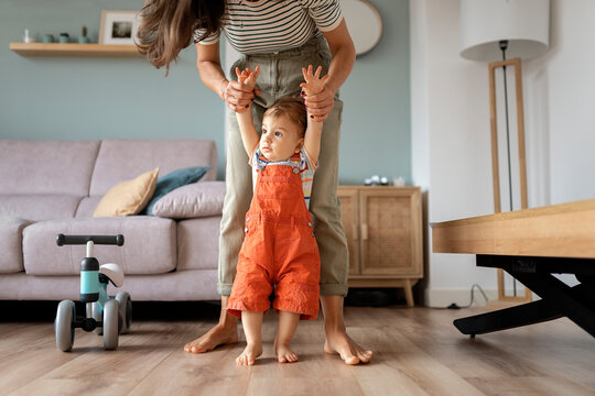 Toddler Taking First Steps