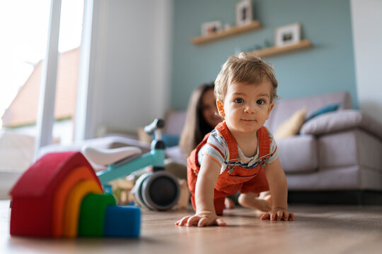Beautiful Toddler Crawling at Home