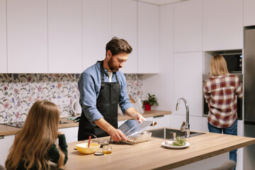 Christmas cook indoor family together kitchen meal