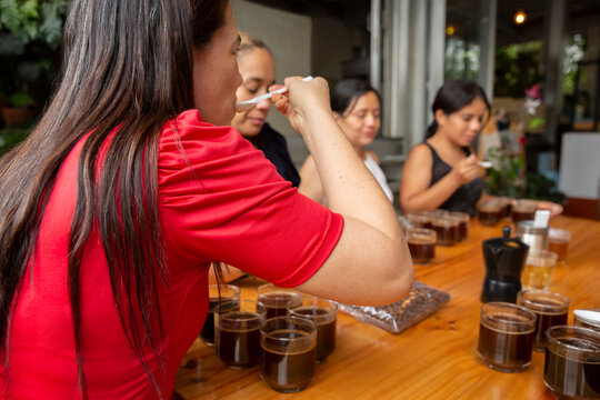 Group of friends tasting coffee