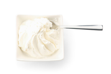 Bowl of delicious cream cheese on white background