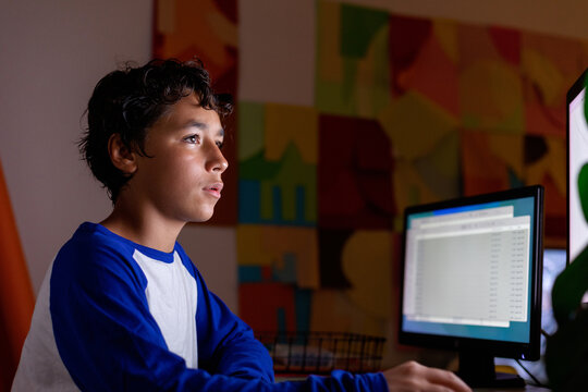 teen boy using computer