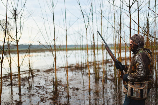 A man duck hunting