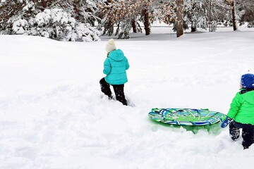 children walking in snow