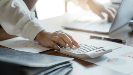 Business Professional Chartered Accountant Woman working with computer and calculator Sales Invoice Accounting