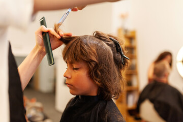 Child at hairdresser