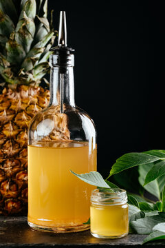 berry tinctures in shorts with fruit and berries on the backgrou