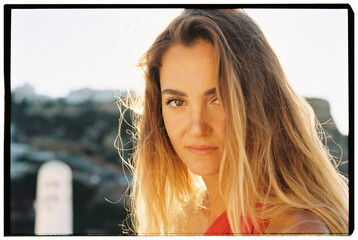 portrait of a beautiful blonde woman in sunlight