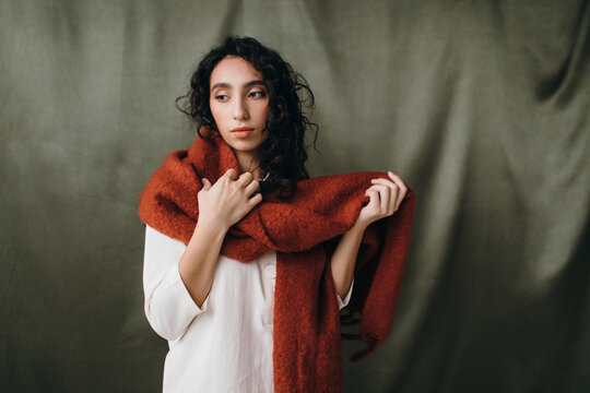 Gorgeous woman portrait in warm clothes