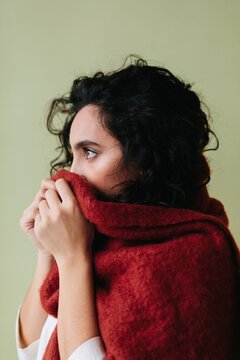 Woman hide in warm clothes - Winter portrait