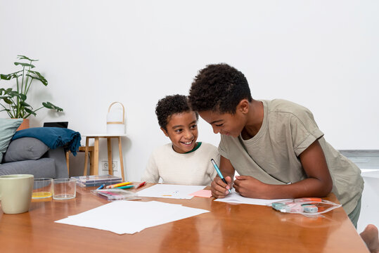 Young Boys Doing Homework After School