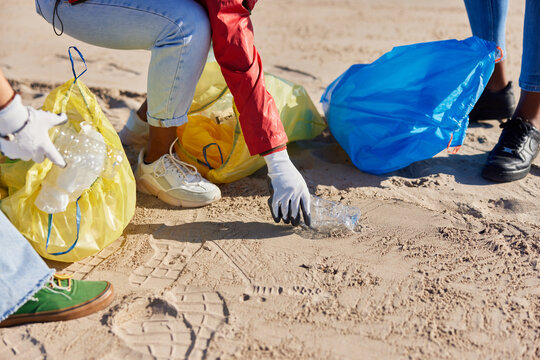 Diverse women collecting plastic litter