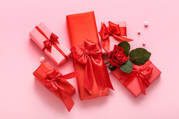 Beautiful gifts for Valentine's Day celebration and rose flower on pink background