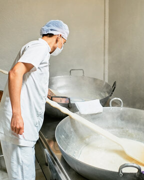 Dairy plant operator working