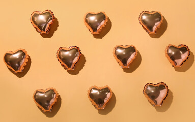 Composition with heart shaped balloons on color background. Valentine's Day celebration