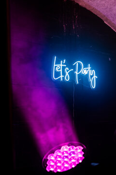 Party neon sign at the disco