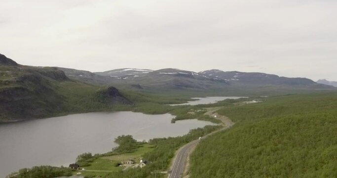 Aerial view at Kilpisj&auml;rvi, Lapland ,Finland and European route E8 that goes from Tromso, Norway to Turku, Finland in summer.