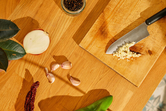Sliced garlic On Table In Kitchen
