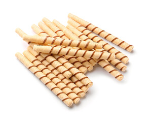Heap of tasty wafer rolls isolated on white background